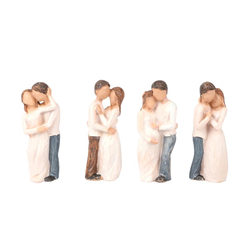 Carved Couple Sculpture